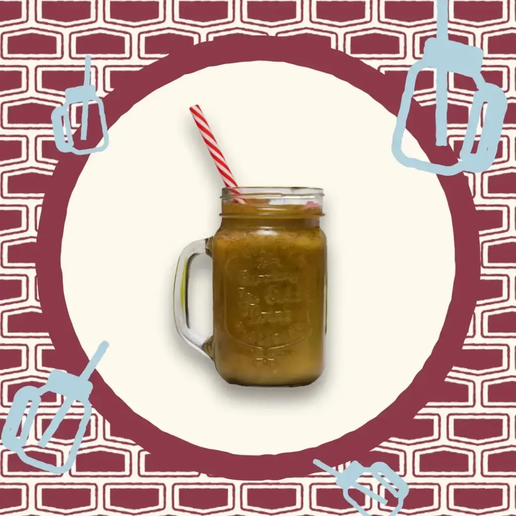 Smoothie en pot Mason avec une paille rouge et blanche, couleur brun-vert